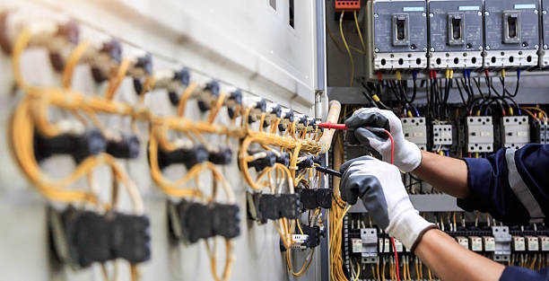 Professional Electrician technician working in Norman, OK